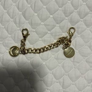 Bandolier charm for cases